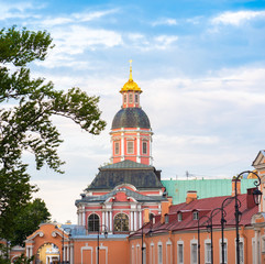 Fototapeta na wymiar Orthodox church with blue sky. One of the buildings in lavra of alexand nevskiy. Saint-Petersburg, Russia.
