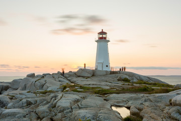Fototapeta na wymiar Nova Scotia,Canada,11,2017:Peggy,s cove lighthouse at sunset and at night
