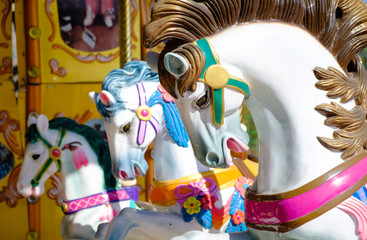 Carousel nHorses on a carnival Merry Go Round view