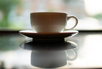 Coffee mug and saucer
