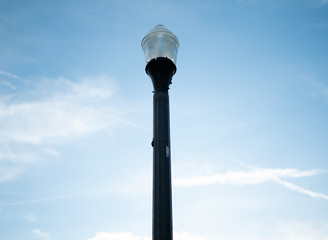 Street light in daytime sky