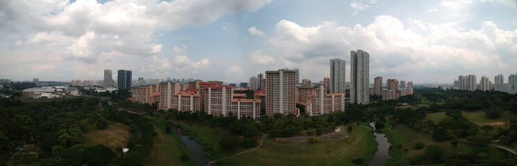 Fototapeta na wymiar panoramic view of a residential estate behind the park