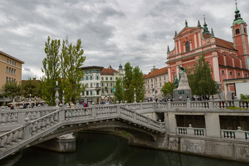 Ljubljana,Slovenia,6,2016: Street, river, bridges with dragons, magical city.