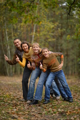 Fototapeta premium Portrait of family of four in park