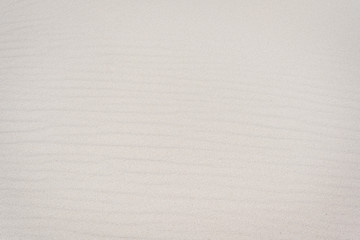 Weißer Sand, Strandsand mit Textfeld Textur mit leichten Wellen Oberfläche und geringe Schärfentiefe
