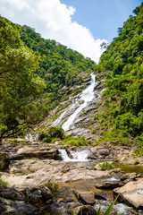 Fototapeta na wymiar Tonanri Waterfall Landscape, nature of the southern part of Hainan Province, China