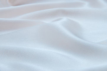 Fototapeta na wymiar white satin fabric as background