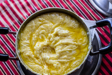 Open of traditional turkish food with butter and cheese in hot pan for breakfast time