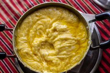 Close-up top shoot of traditional turkish food with butter and cheese in pan for breakfast time