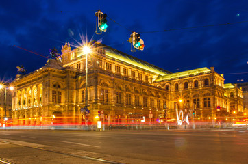 Fototapeta na wymiar Vienna opera house long exposure photography during the night with light trail