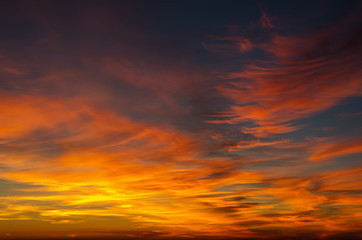 Naklejka na ściany i meble Vivid sky illuminated by the sunset
