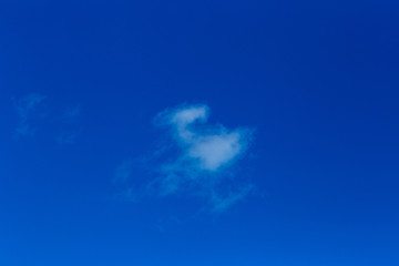 white cloud in blue sky shot on a summer day