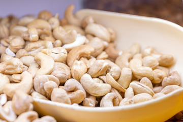 Raw cashews on the counter in the store. Close-up. Background.