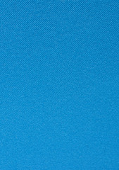 Texture of a blue gym mat. Yoga mat texture.
