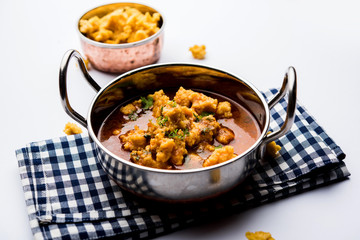 Home made mung dal masala vadi also known as Moong wadi or moongwadi or moongodi sabzi. It's a popular Maharashtrian recipe especially from Vidarbha region.