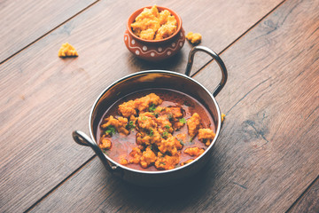Home made mung dal masala vadi also known as Moong wadi or moongwadi or moongodi sabzi. It's a popular Maharashtrian recipe especially from Vidarbha region.