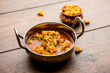 Home made mung dal masala vadi also known as Moong wadi or moongwadi or moongodi sabzi. It's a popular Maharashtrian recipe especially from Vidarbha region.
