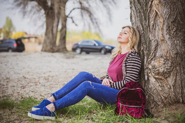 Nice European or American plump girl at park, concept of modern women lifestyle, walk in autumn...