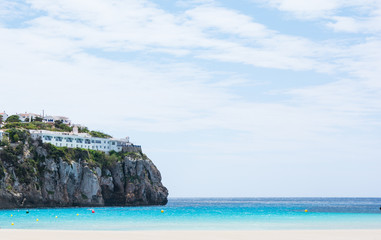 Beautiful turquoise water on the white sandy beach of Cala en Porter, Menorca - obrazy, fototapety, plakaty