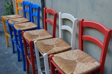 A row of colourful chairs