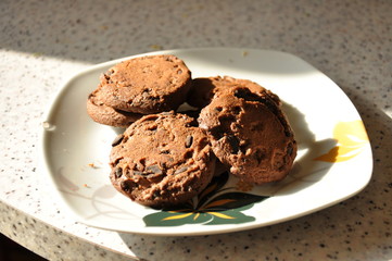chocolate chip cookies on a white plate