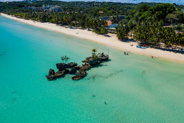 Aerial view of the famous White Beach and Willy's Rock on Boracay island in the Philippines