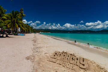 BORACAY, PHILIPPINES - 18 JUNE 2019: A sandcastle on White Beach on the Philippine island of Boracay.  