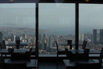 Fototapeta na wymiar The view from the window of a skyscraper Istanbul Sapphire on the city. Cafe on the top floor. Megalopolis Business Center. Panoramic view of Istanbul