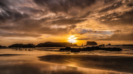 Dramatic storm clouds at sunset at the Oregon Coast 