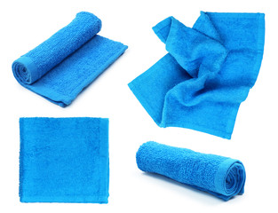 Collection of blue towels on isolated white background