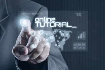 Business man pointing to virtual screen. Education & Technology Concept