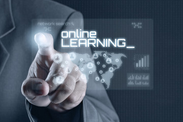 Business man pointing to virtual screen. Education & Technology Concept
