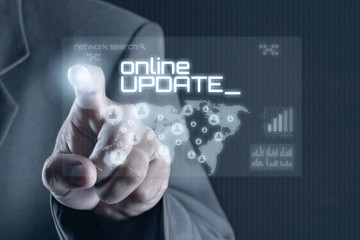 Obraz premium Business man pointing to virtual screen. Business & Technology Concept