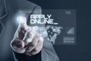 Business man pointing to virtual screen. Business & Technology Concept