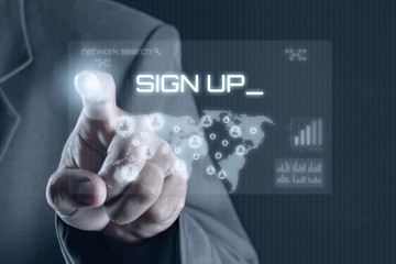 Business man pointing to virtual screen. Business & Technology Concept