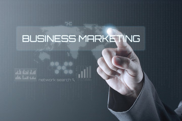 Business man pointing to virtual screen. Business Concept