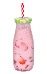 Banana and strawberry milkshake in a glass bottle with a green checked lid and a red striped straw. 