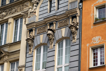 Fototapeta na wymiar Stone bas-reliefs on the walls of Gdansk