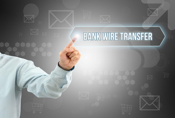 Business man touch a button on an imaginary screen with text