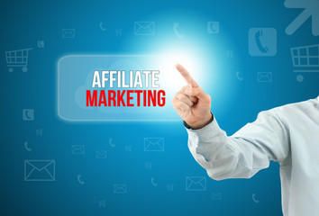 Business man touch a button on an imaginary screen with text AFFILIATE MARKETING