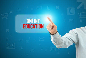 Business man touch a button on an imaginary screen. ONLINE EDUCATION CONCEPT