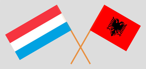 Albania and Luxembourg. Crossed Albanian and Luxembourgish flags