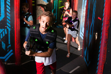 Boy playing laser tag