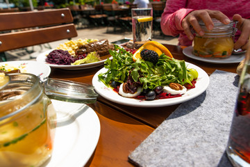 Table with meals, soups and salads.