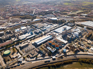 Fototapeta premium Top view of the chemical plant and the surrounding area