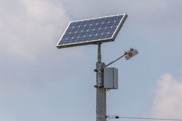 Eco friendly Autonomous Led street light projector with solar panel for daytime charging.
