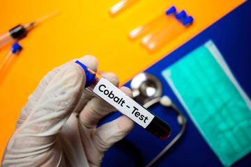 Cobalt - Test with blood sample. Top view isolated on color background. Healthcare/Medical concept