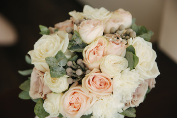White gold rings on wedding bouquet. flowers
