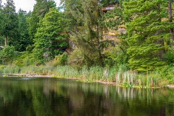 Fototapeta premium View at Mountain Lake with Dramatic Clouds in British Columbia, Canada.