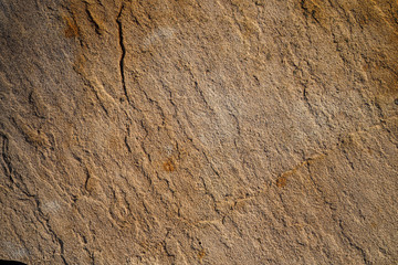 Kamień naturalny, piaskowiec, tekstura przy naturalnym oświetleniu - obrazy, fototapety, plakaty